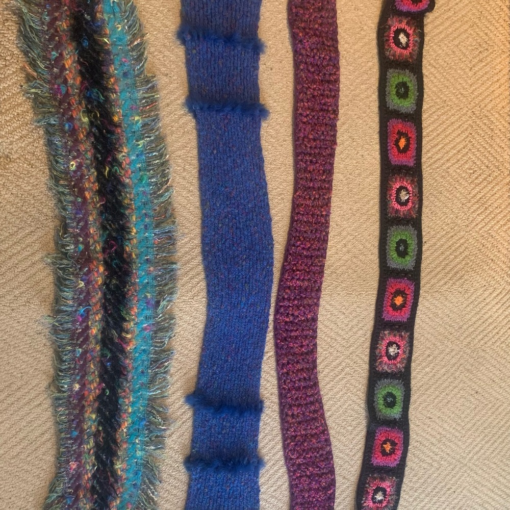 Selling 4 barely worn winter scarves